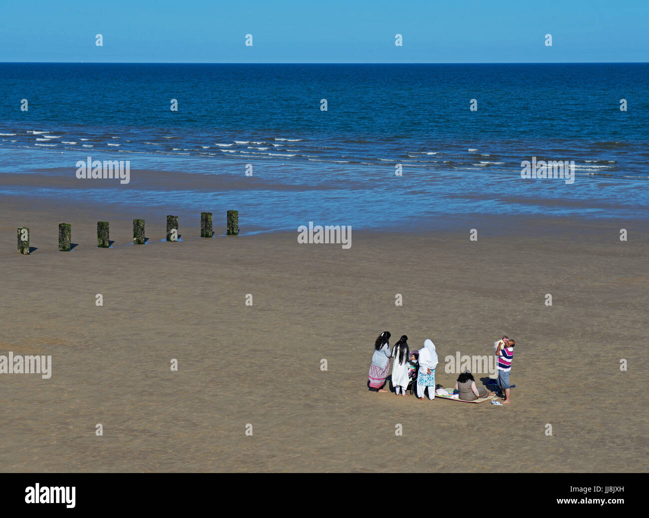 Asian family at the beach hi-res stock photography and images - Alamy