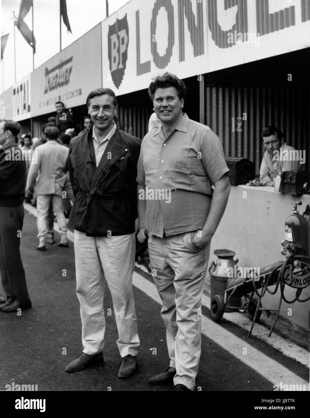 Tim Parnell (L) and Roy Salvadori (R) circa1965 Clermont Ferrand Circuit Stock Photo
