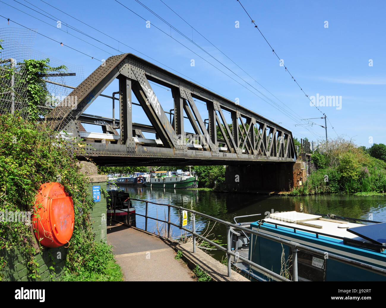 Traditional railway girder bridge over the Great Ouse River at Ely