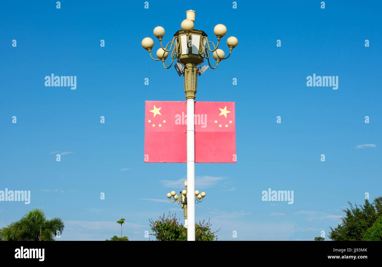 Chinese flag on the street light pillar Stock Photo