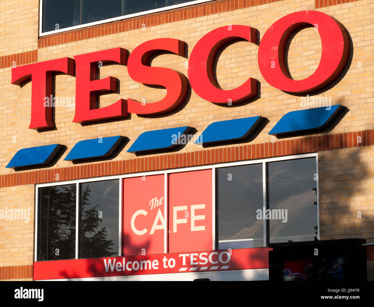 Tesco Extra supermarket name over store entrance, company founded by