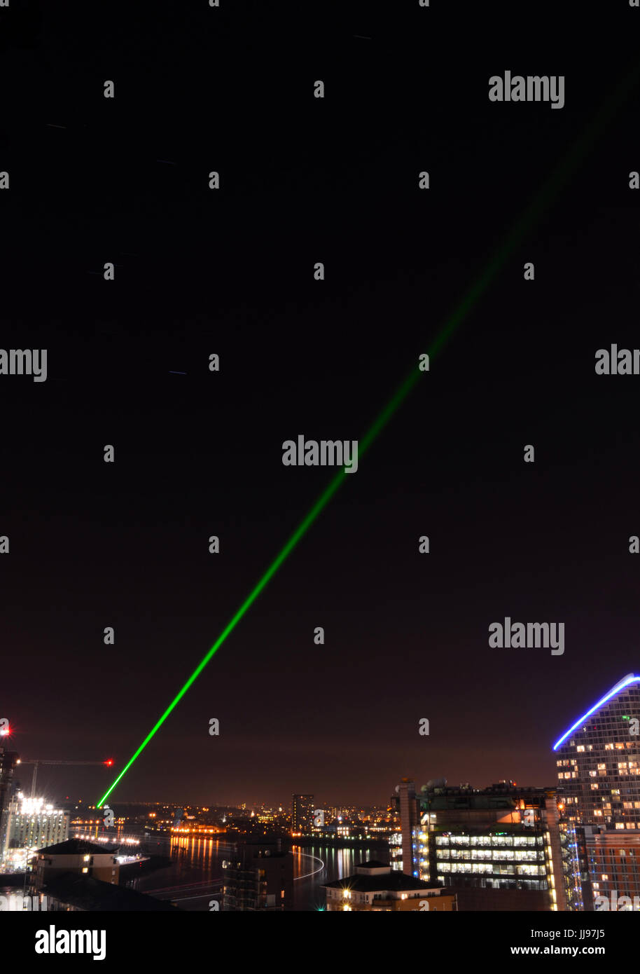 The river Thames with Greenwich and the Greenwich Meridian Line marked out by a green lazer shone from the Royal Greenwich Observatory Stock Photo