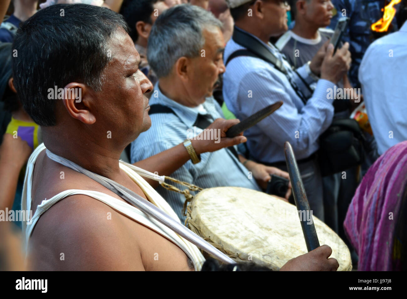 Drummer plays during Hindu festival of Dashain, Nepal Stock Photo