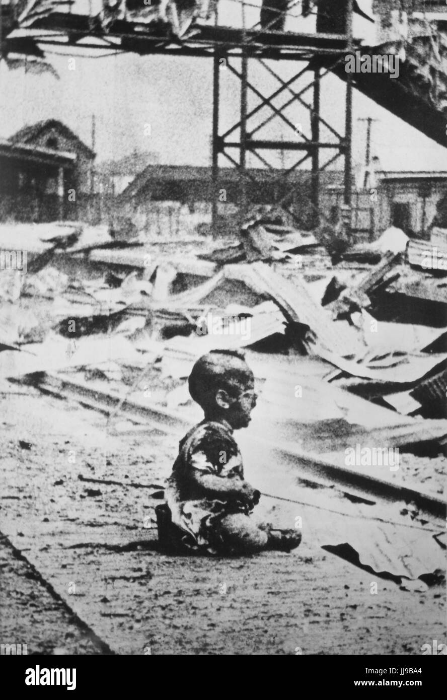 Chinese Child Left at Shaghai Railway Station after Japanese Bombing during Second Sino-Japanese War, 1937 Stock Photo