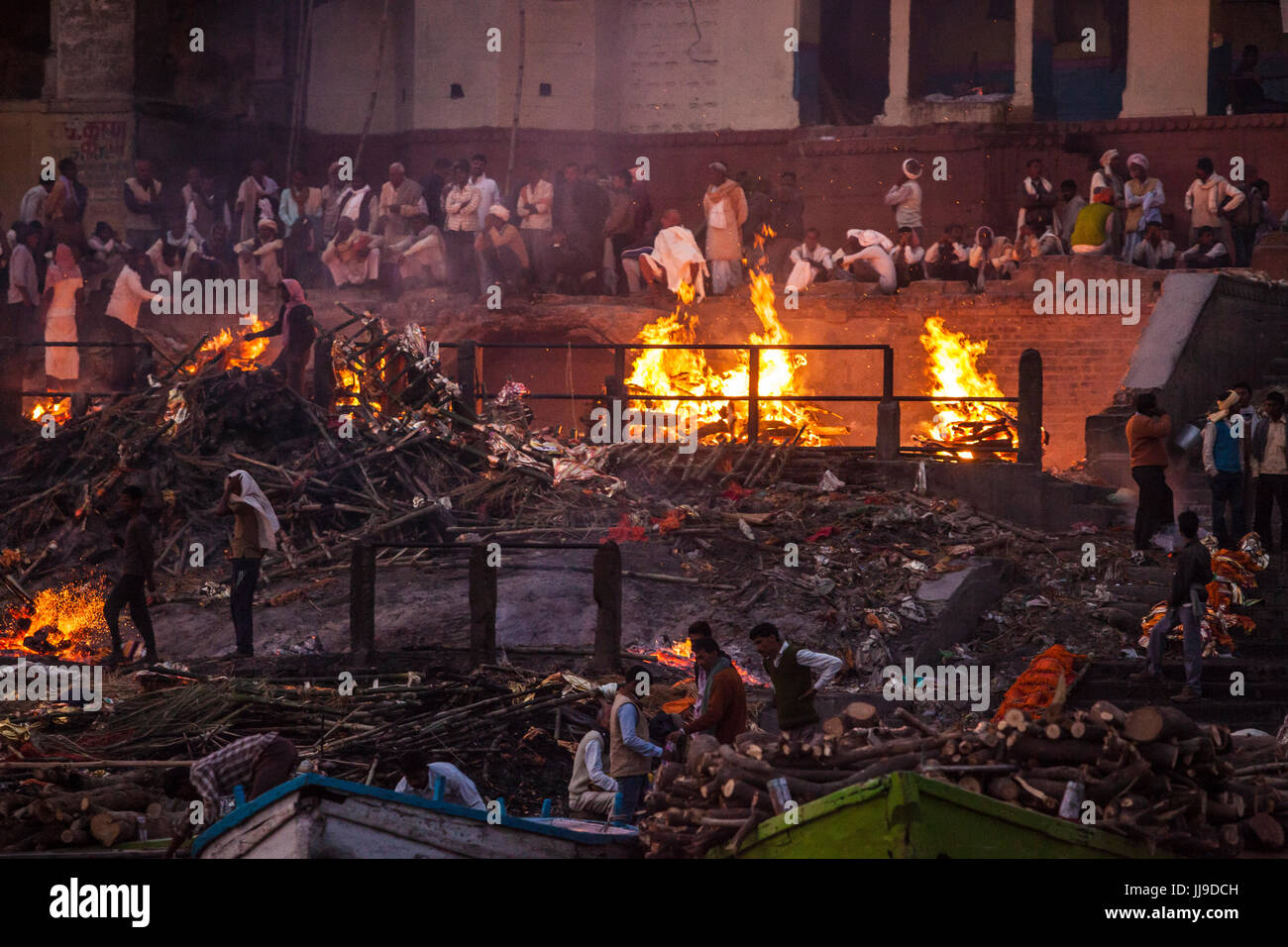 Cremation funeral pyres at early evening. Manikarnika Ghat, Varanasi