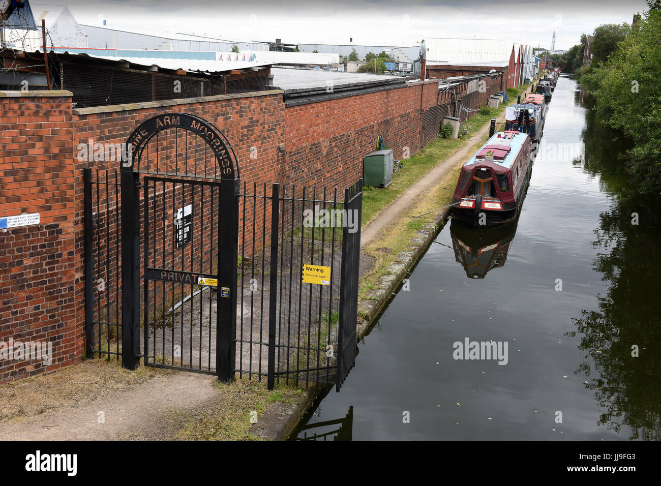 Gated security for the Engine Arm Residential Moorings on a dead-end arm of the Birmingham Canal Navigation in Smethwick, West Midlands, Uk Stock Photo