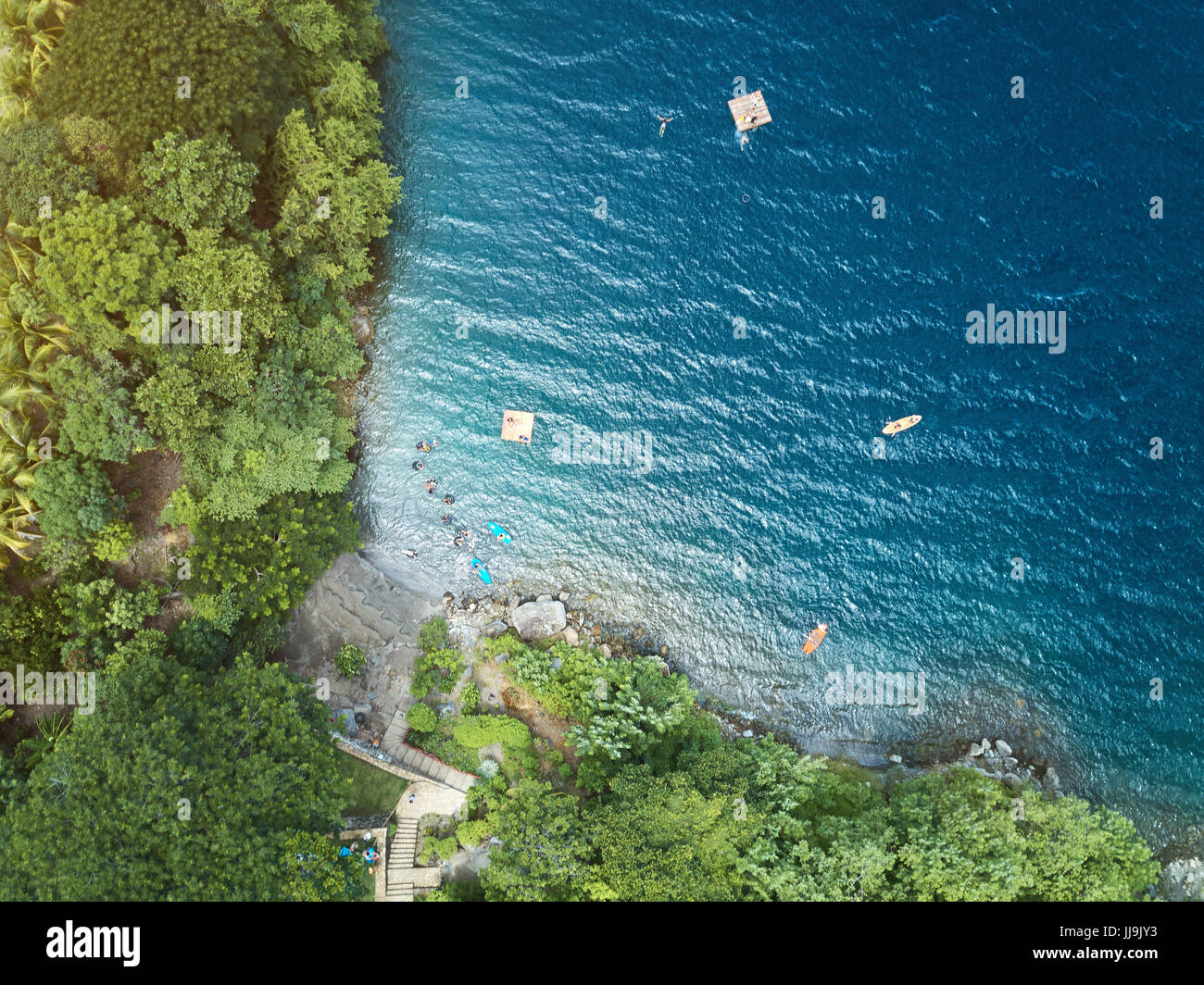 Top view of blue lagoon water. People doing water beach activity Stock Photo