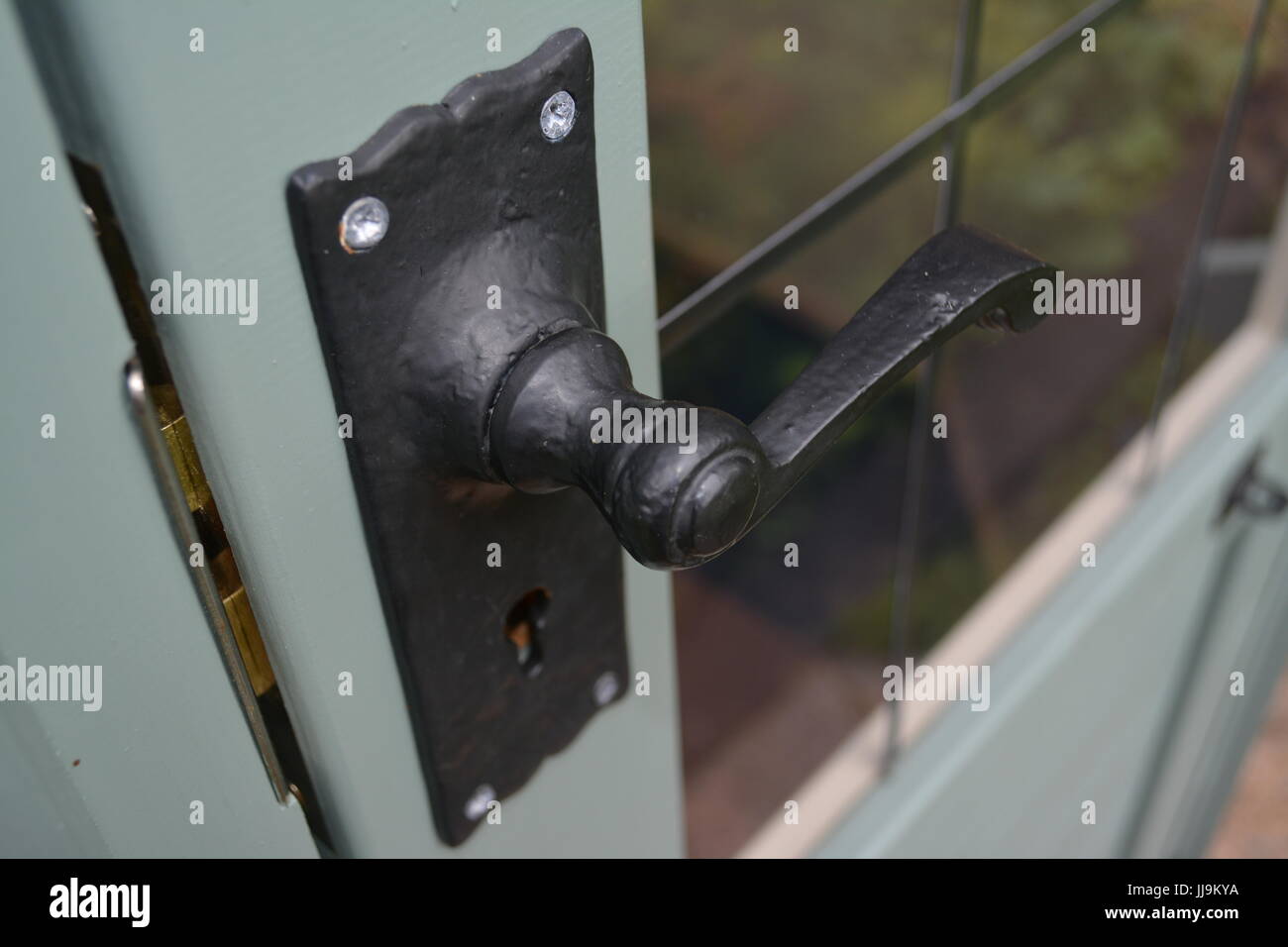 Black metal lockable door handle re security fixing architecture Stock Photo