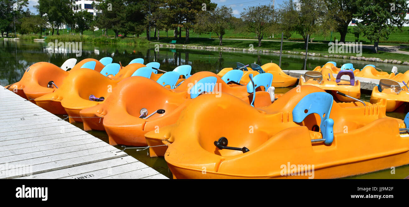 Paddle boats in a lagoon Stock Photo Alamy