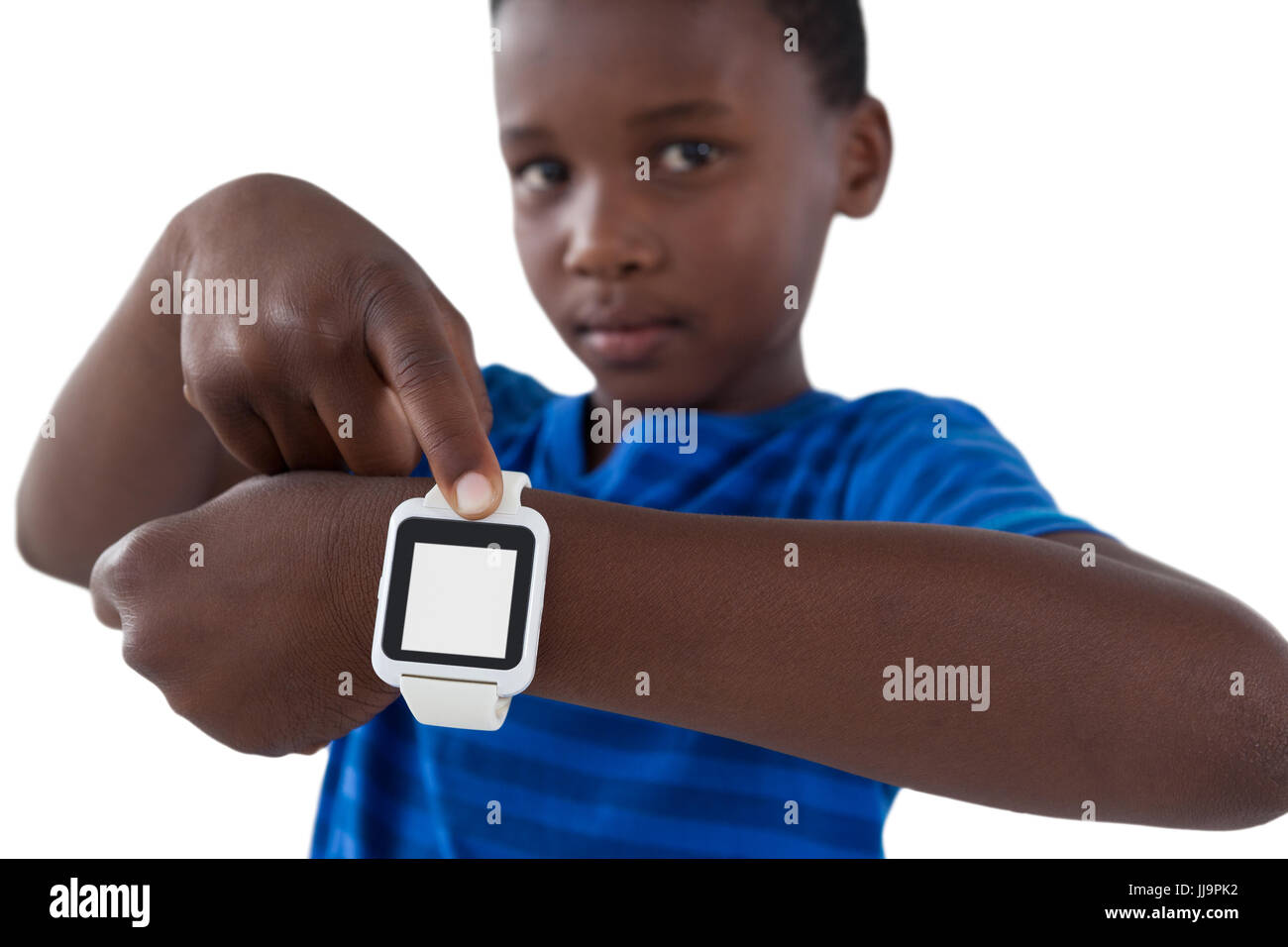 Portrait of cute boy showing his smart watch Stock Photo