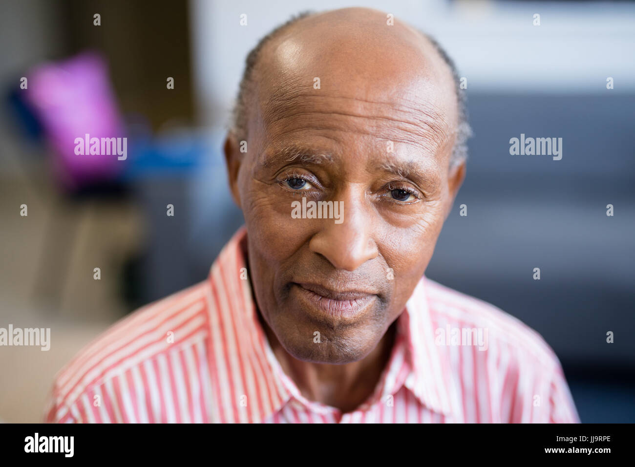 Portrait of senior man with receding hairline at nursing home Stock Photo