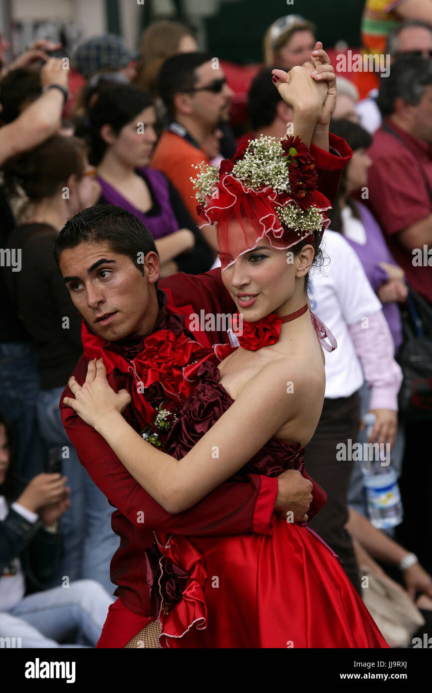 A floral couple dancing at the Madeira Flower Festival Parade, Funchal, Madeira, Portugal Stock Photo