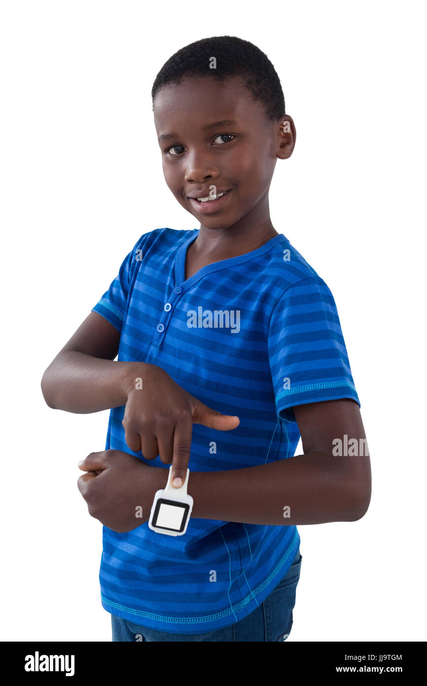 Portrait of smiling boy showing his smart watch Stock Photo