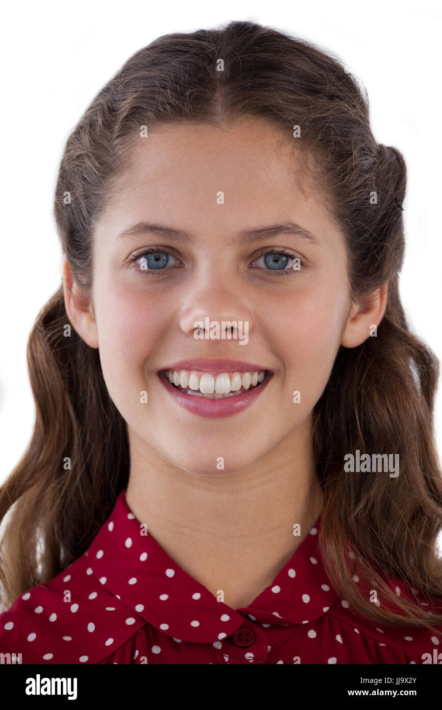 Portrait of smiling girl against white background Stock Photo - Alamy