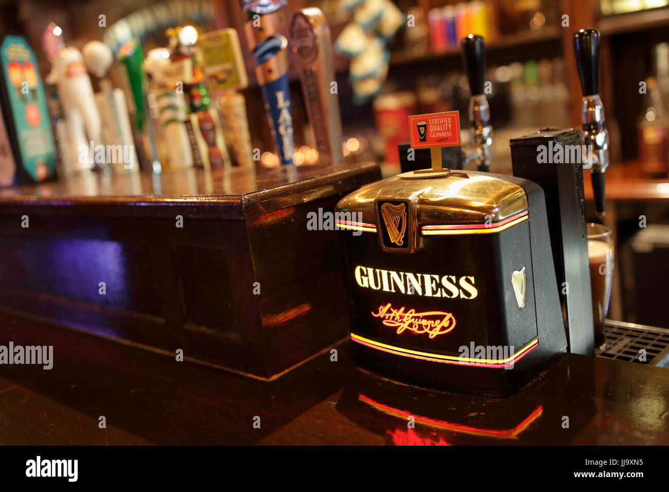 Guinness tap at an Irish pub, USA Stock Photo