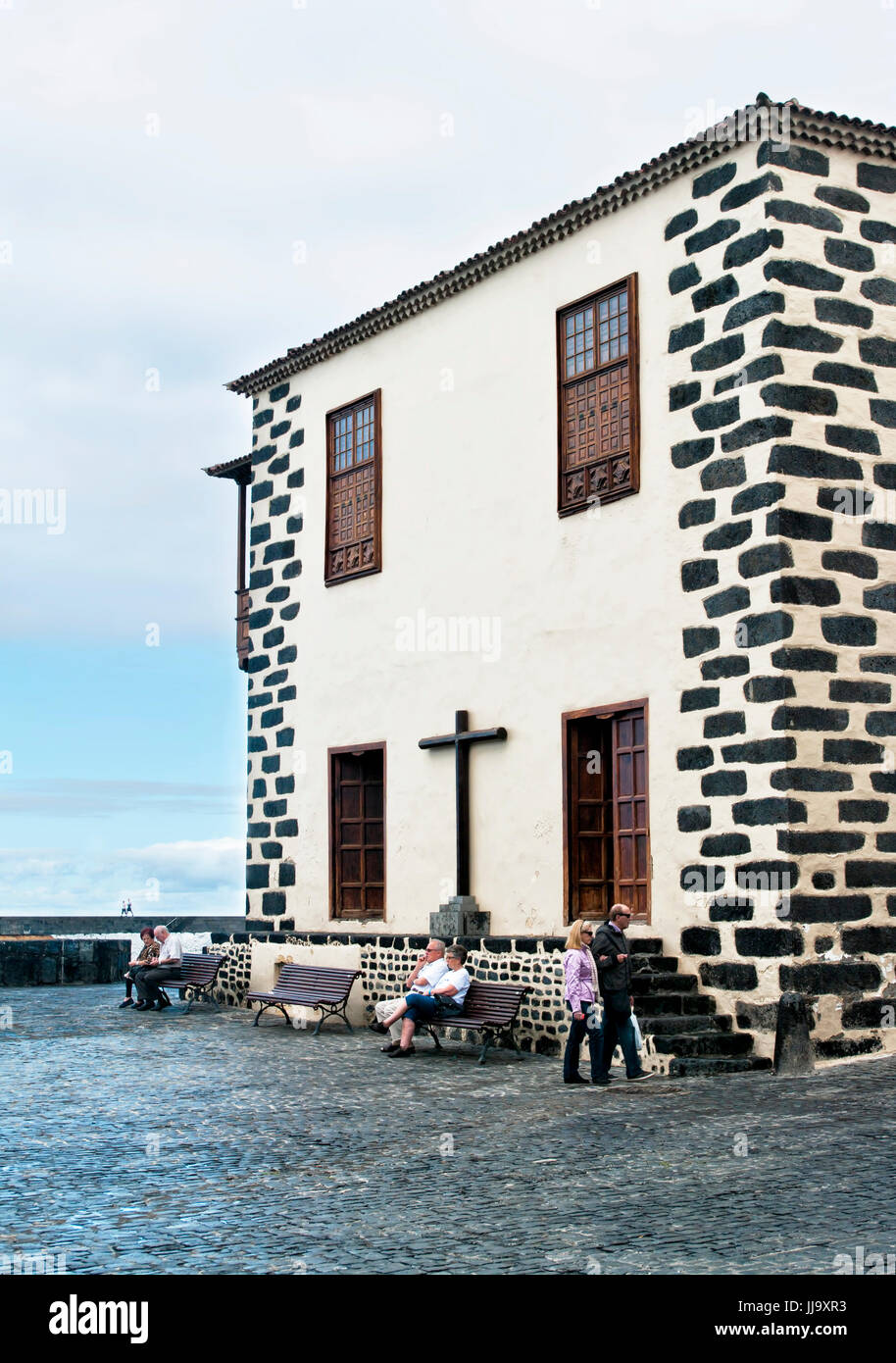 four senior couples near church in puerto de la cruz, tenerife Stock Photo