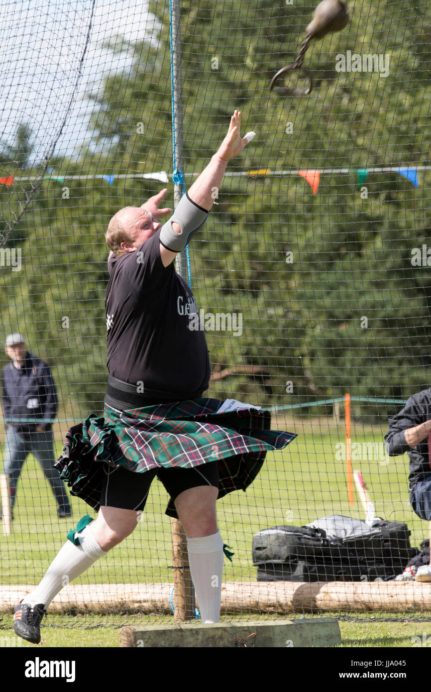 Stonehaven, Scotland, UK. 16th July, 2017. A competitor in the Weight for distance event at the Highland Games event in Stonehaven, Scotland. Stock Photo