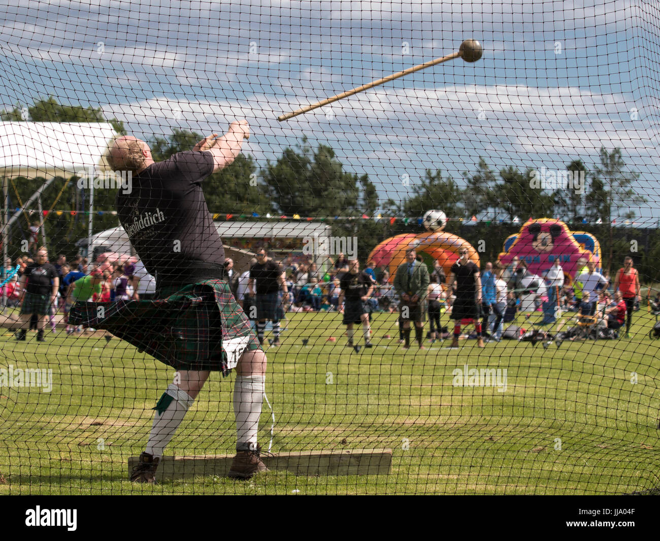Stonehaven, Scotland - 16 July 2017: A competitor in the Hammer Throw at the Highland Games in Stonehaven, Scotland. Stock Photo