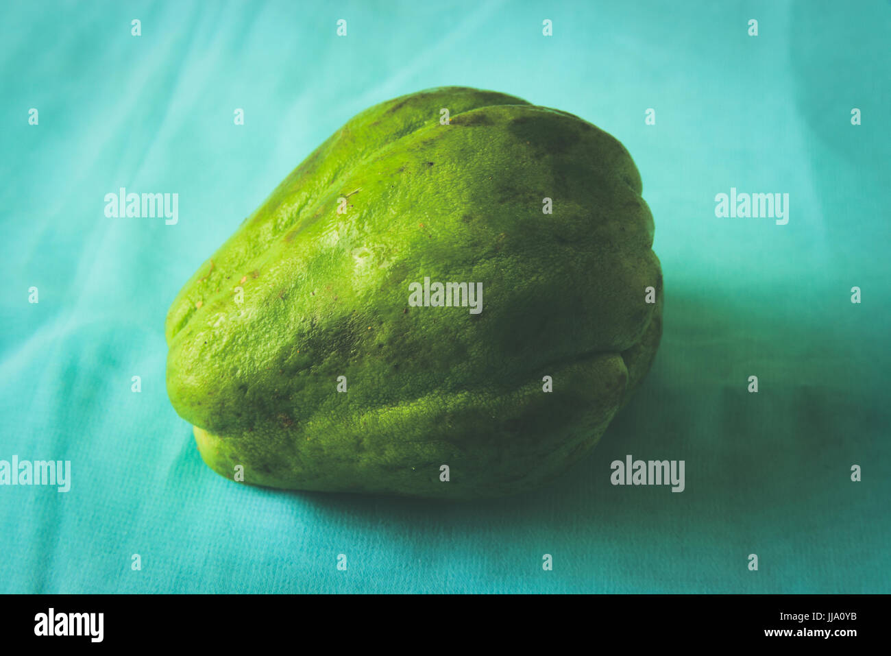 Freshly picked chayote from a local farmer's market. Stock Photo