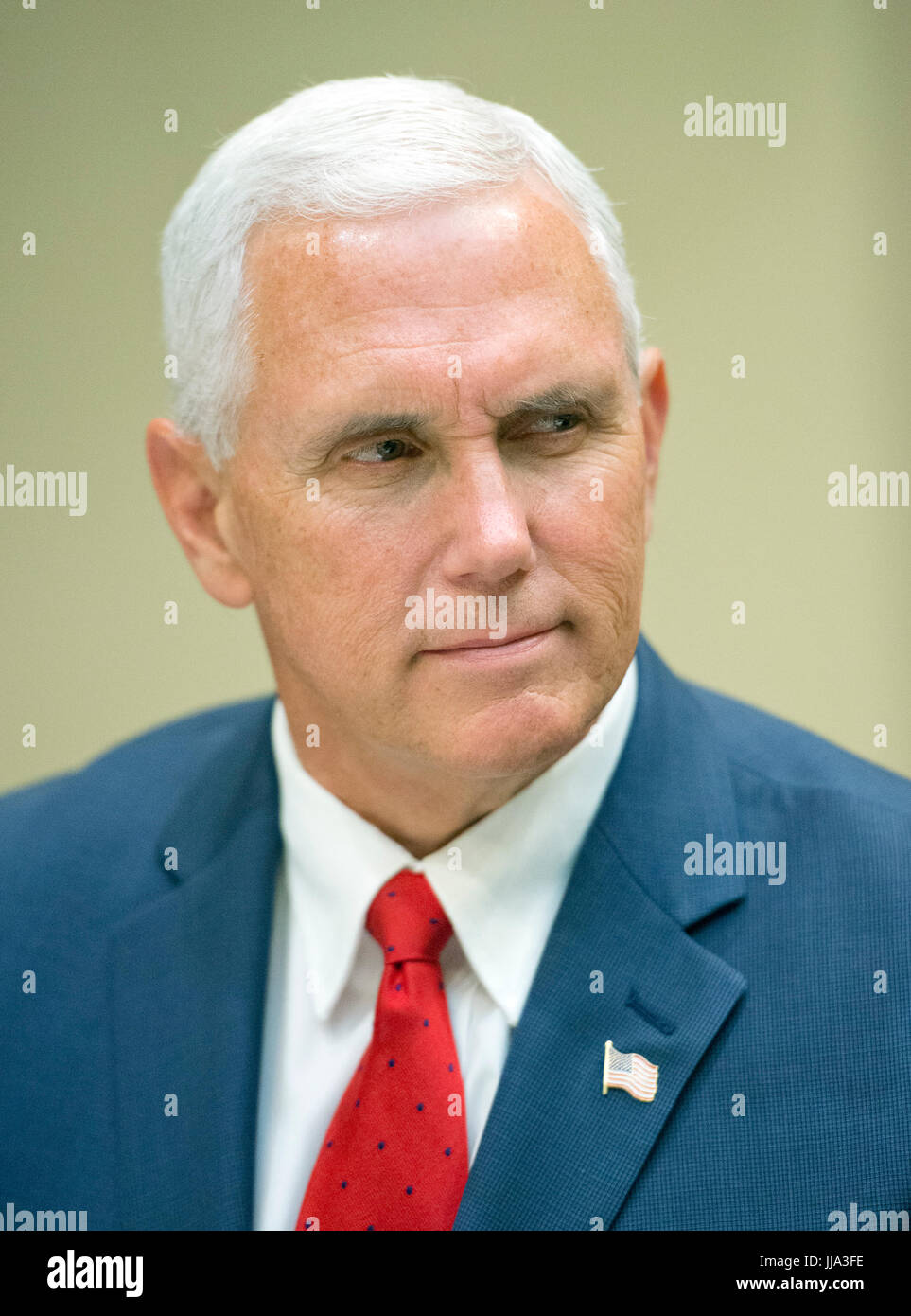 Washington, USA. 18th Jul, 2017. United States Vice President Mike Pence listens as President Donald J. Trump makes remarks to the press prior to having lunch with four veterans of Afghanistan in the Roosevelt Room of the White House in Washington, DC on Tuesday, July 18, 2017. In his remarks the President said he was "disappointed" about the GOP failure to pass a healthcare bill and said his plan was to "let Obamacare fail. Credit: MediaPunch Inc/Alamy Live News Stock Photo