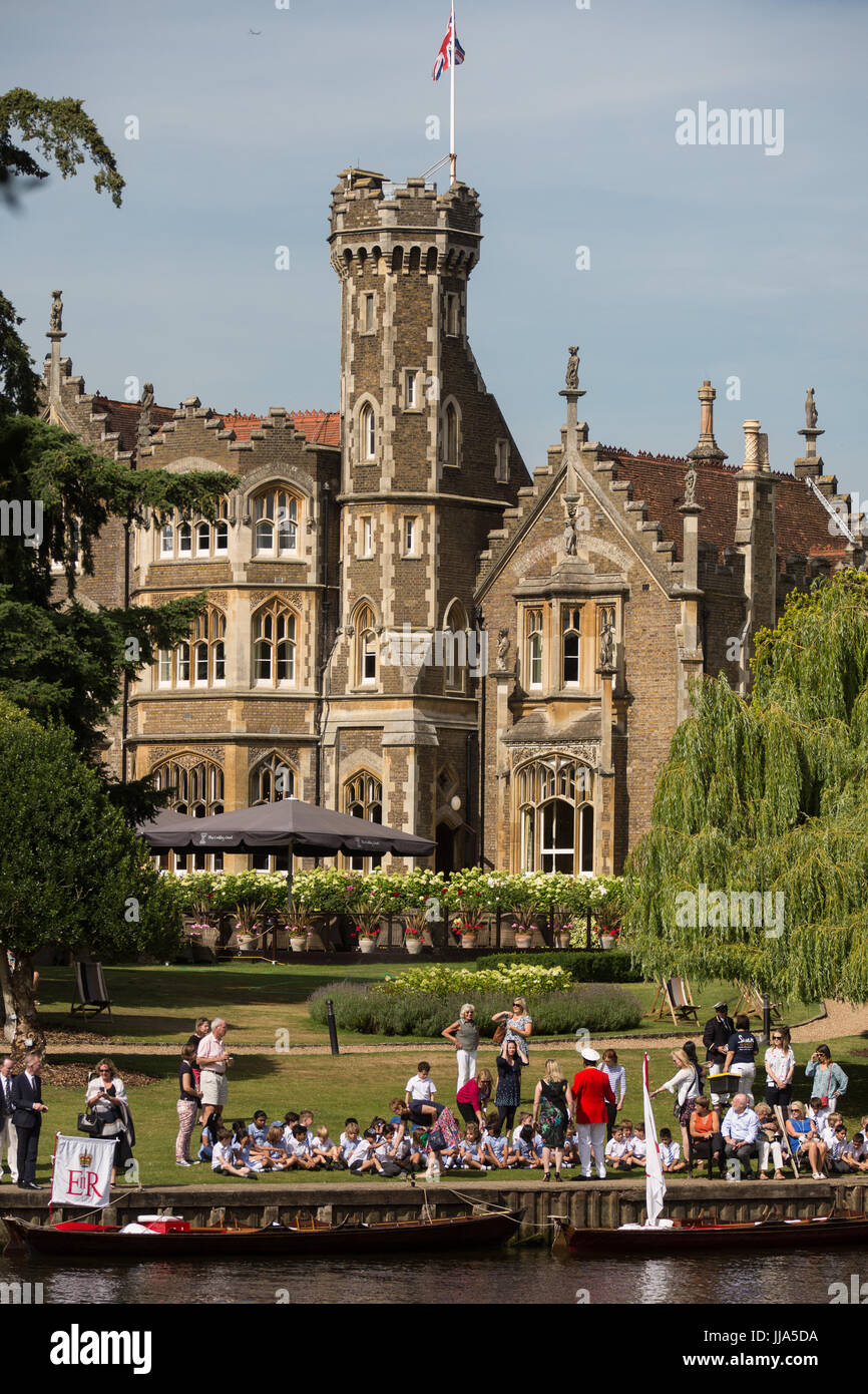 Oakley Court, UK. 18th July, 2017. Swan Uppers arrive at Oakley Court hotel on the second day of the Swan Upping census for a demonstration to local schoolchildren. Swan Upping is an annual five-day ceremonial swan census requiring the gathering, marking and releasing of all cygnets, or mute swans, on the River Thames. It dates back more than 800 years, to when the Crown claimed ownership of all mute swans. The second day of the census takes place between Windsor Bridge and Marlow Lock. Credit: Mark Kerrison/Alamy Live News Stock Photo