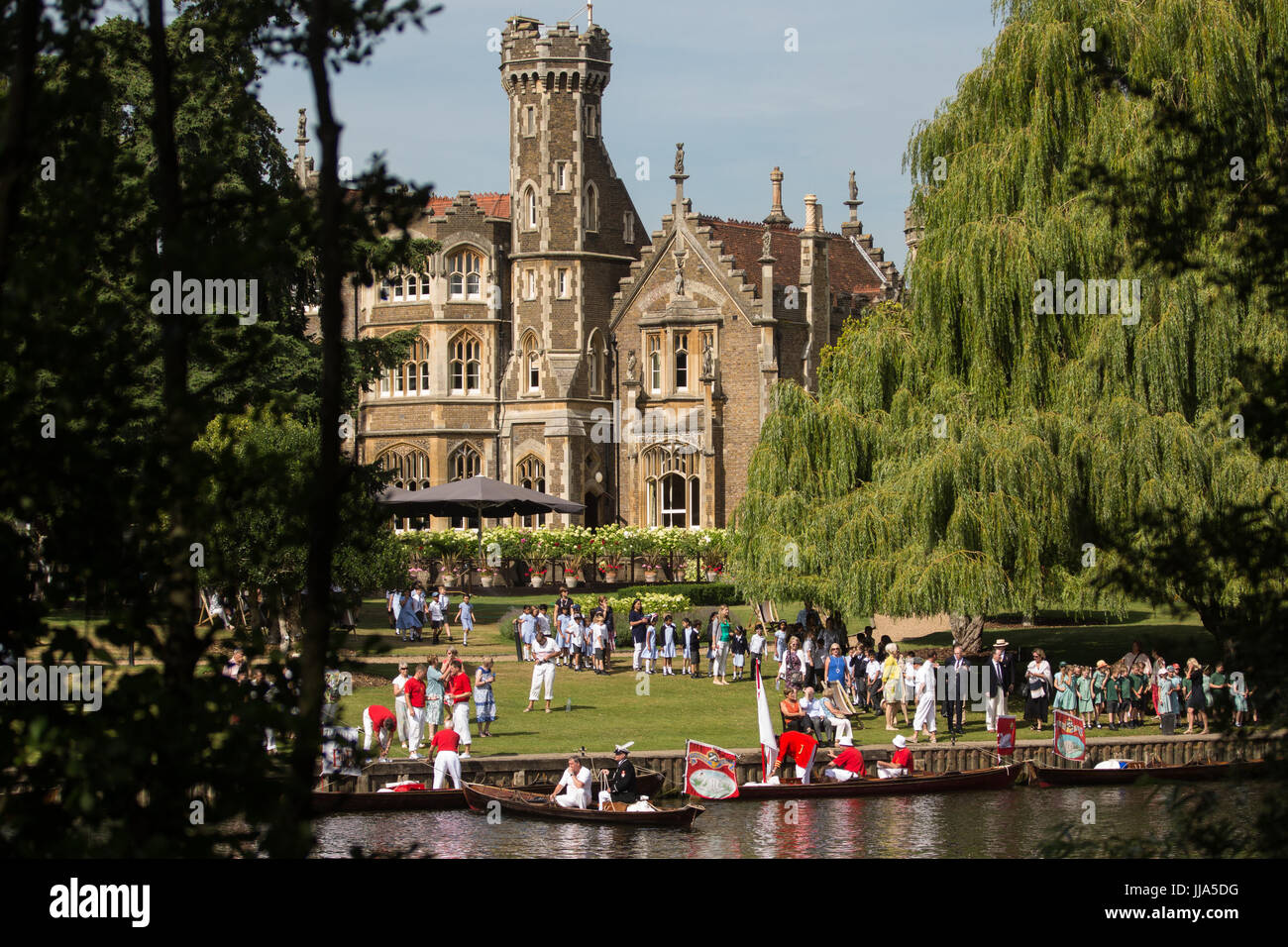 Oakley Court, UK. 18th July, 2017. Swan Uppers arrive at Oakley Court hotel on the second day of the Swan Upping census for a demonstration to local schoolchildren. Swan Upping is an annual five-day ceremonial swan census requiring the gathering, marking and releasing of all cygnets, or mute swans, on the River Thames. It dates back more than 800 years, to when the Crown claimed ownership of all mute swans. The second day of the census takes place between Windsor Bridge and Marlow Lock. Credit: Mark Kerrison/Alamy Live News Stock Photo