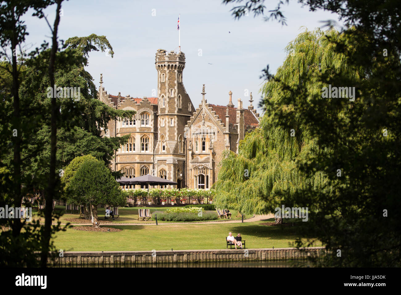 Oakley Court, UK. 18th July, 2017. Oakley Court in Bray seen from the opposite bank of the River Thames. A Victorian Gothic country house built in 1859, it is Grade II* listed and has often been used as a film location, notably by Hammer Films. Credit: Mark Kerrison/Alamy Live News Stock Photo