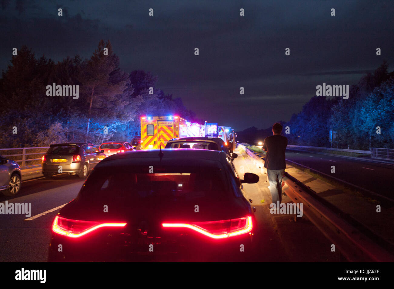 Flintshire, North, UK. 18th July, 2017. UK Weather. A serious road traffic accident this evening at Dobshill Interchange Emgergency Services at the Scene treating injured and Accident Investigation on Scene. Road clear of traffic by reversing off A55 into Dobshill down slip road. Credit: DGDImages/Alamy Live News Stock Photo