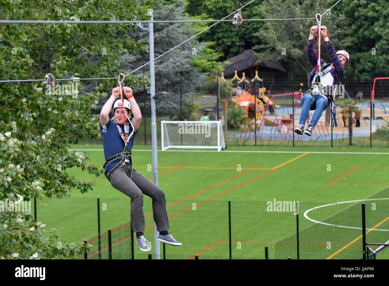 London, UK. 19th July, 2017. Brave participants ride a newly installed 225m long zip wire in Archbishop's Park on the South Bank. Descending from the top of a 35m tower, riders are afforded bird's eye view of the capital. Called Zip World London, the rides are offered to the public until 1 October 2017. Credit: Stephen Chung/Alamy Live News Stock Photo