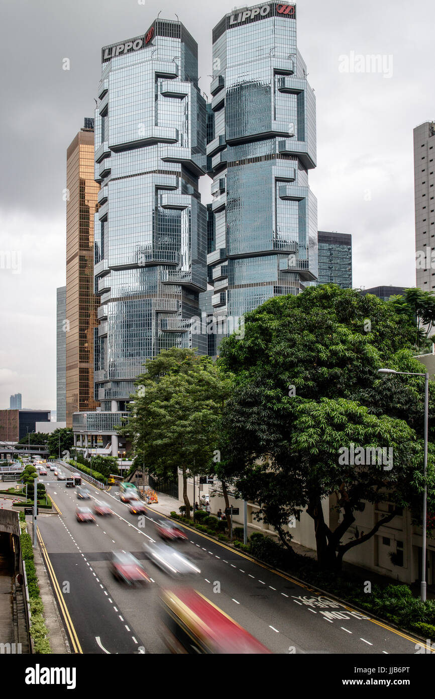 Twin Lippo Buildings with Far East Finance Building behind, and busy Cotton Tree Drive, Hong Kong Stock Photo