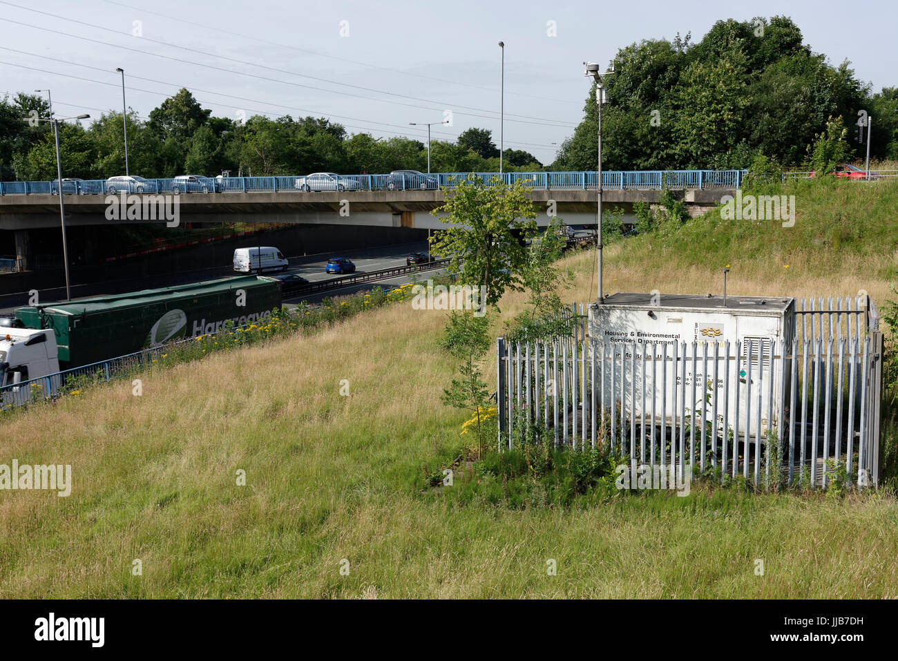 Pollution monitor, Air monitoring unit on M60 motorway embankment j17 ...