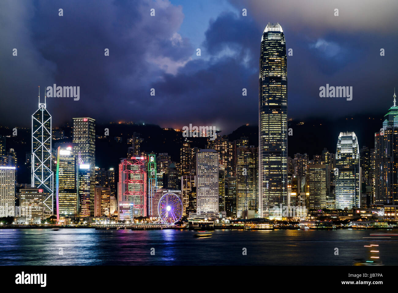 Dynamic image of Victoria Harbor, Hong Kong at twilight, on a beautiful night. Stock Photo