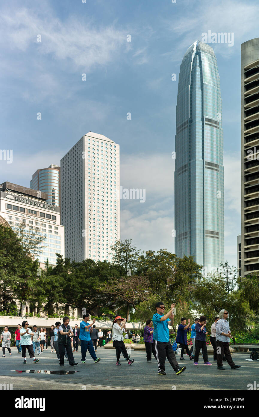 A group of people practice Tai Chi in Charter Garden, Hong Kong Stock Photo