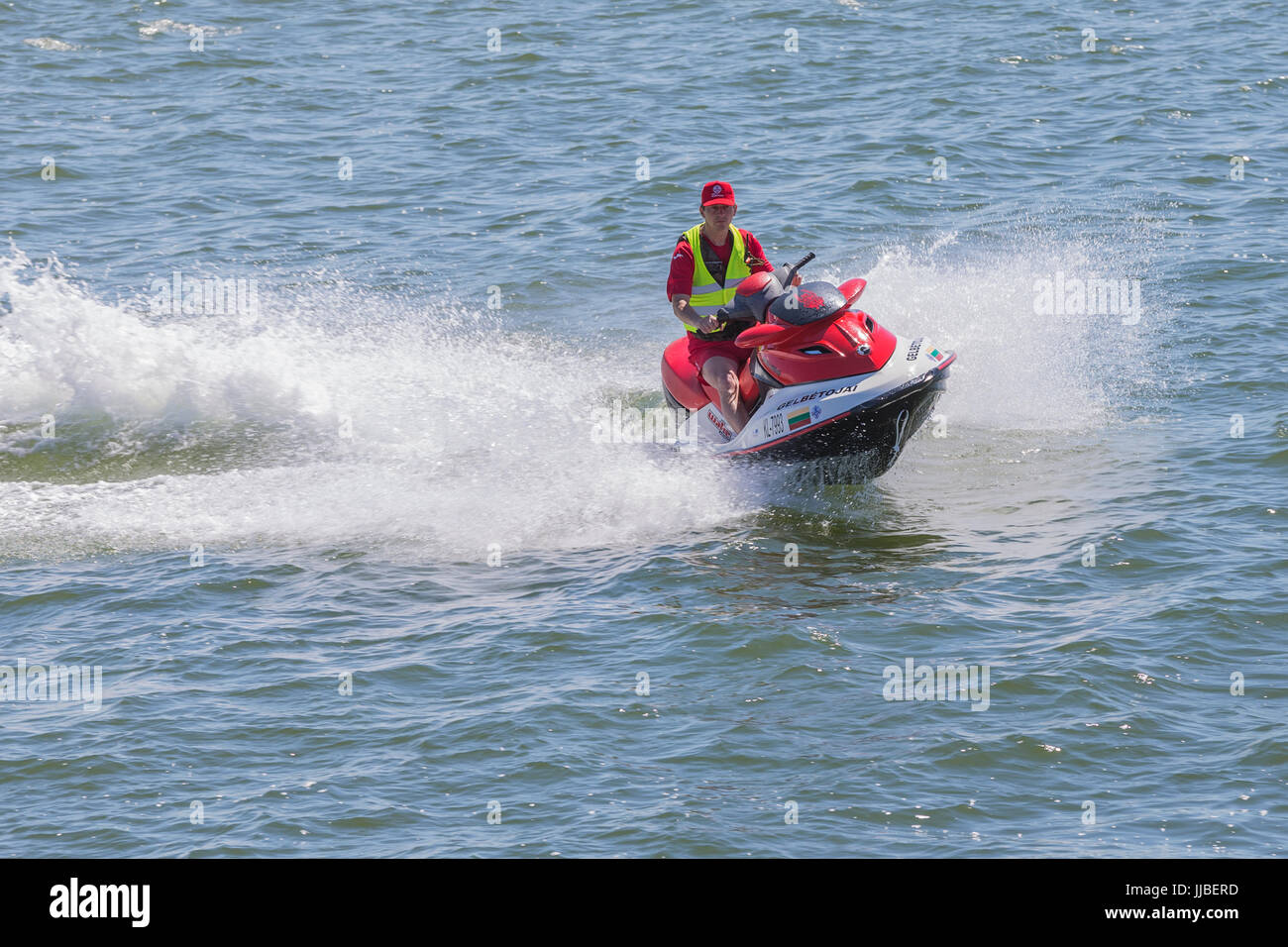 Rescuer on the water at work, Palanga, Lithuania. Stock Photo