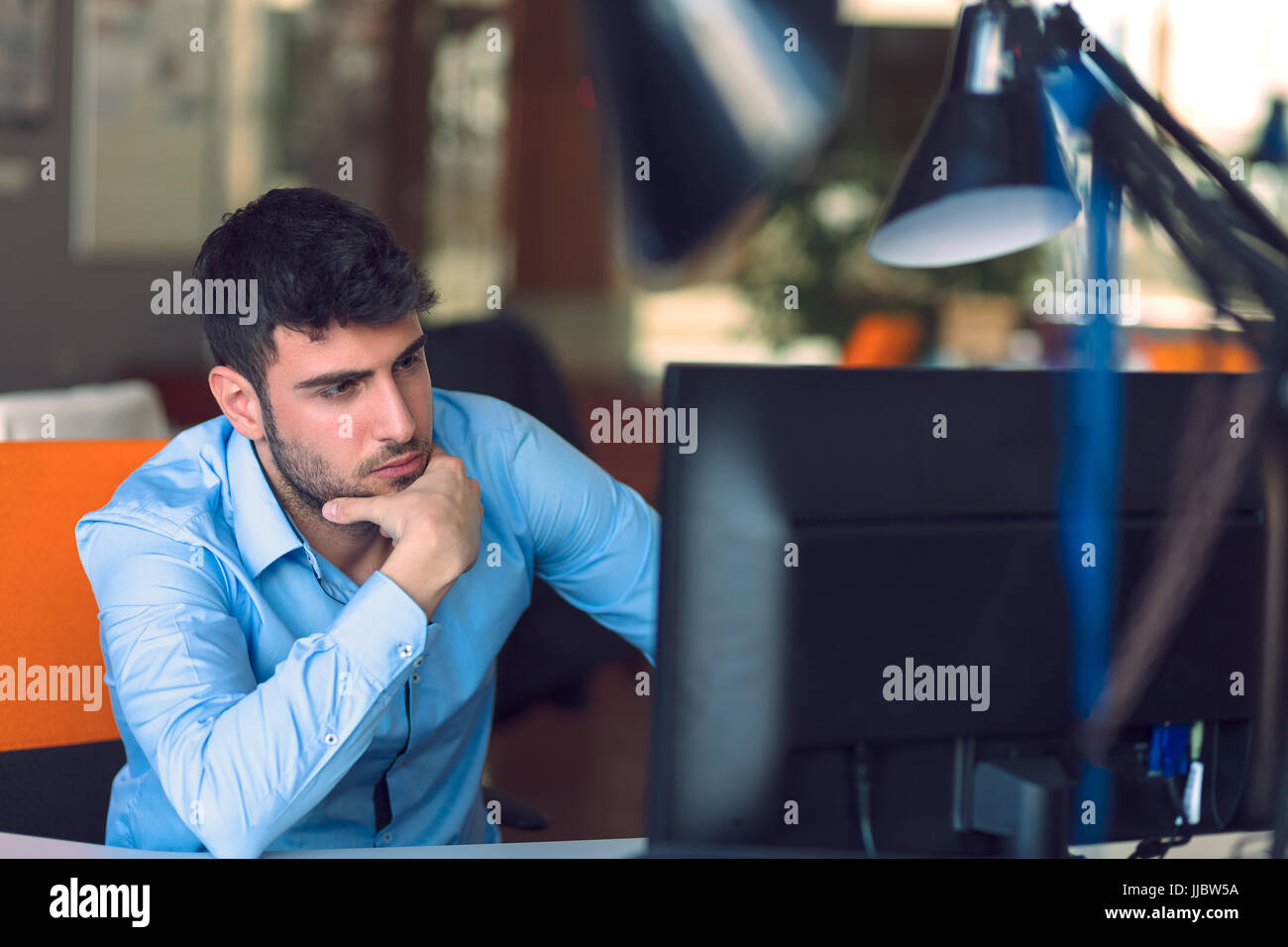 Freelance programmer working in startup office Stock Photo - Alamy