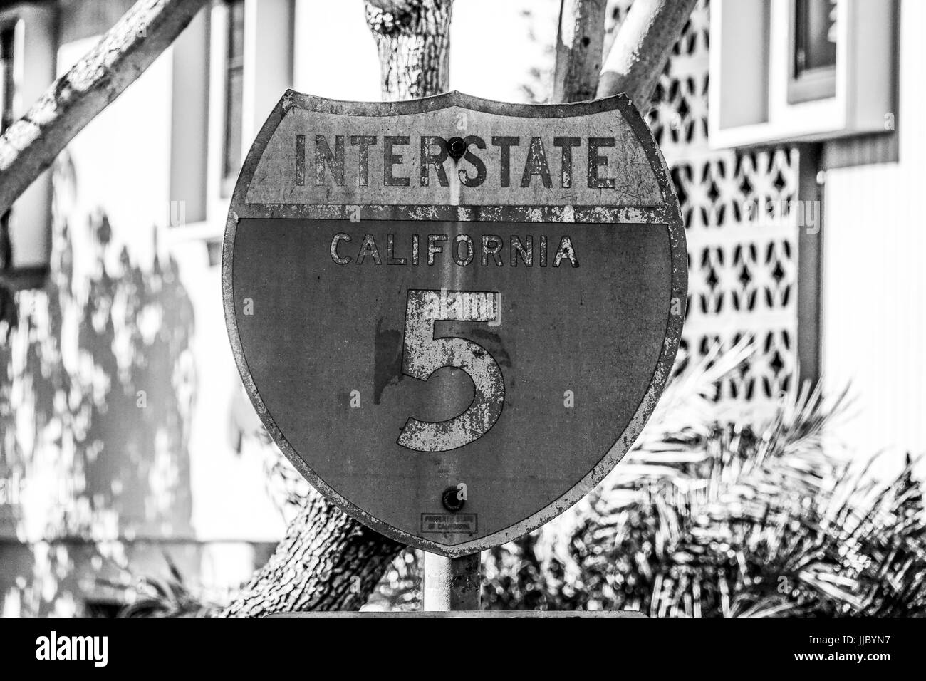 Old rusty street sign Interstate 5 California Stock Photo