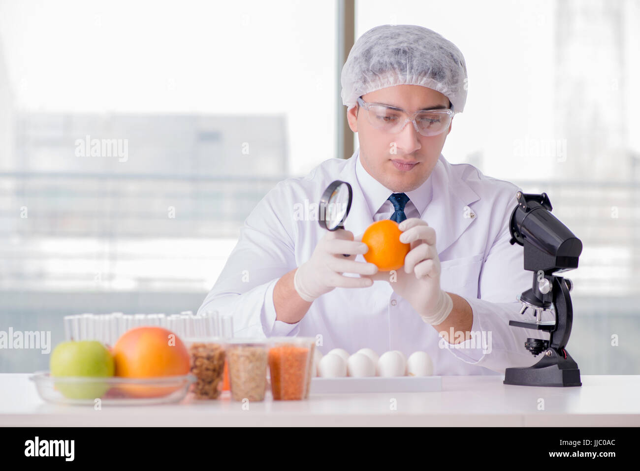 Nutrition expert testing food products in lab Stock Photo Alamy