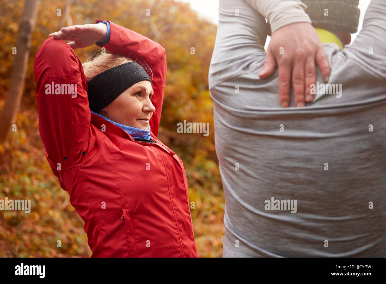 Older couple stretching their arms and hands Stock Photo Alamy