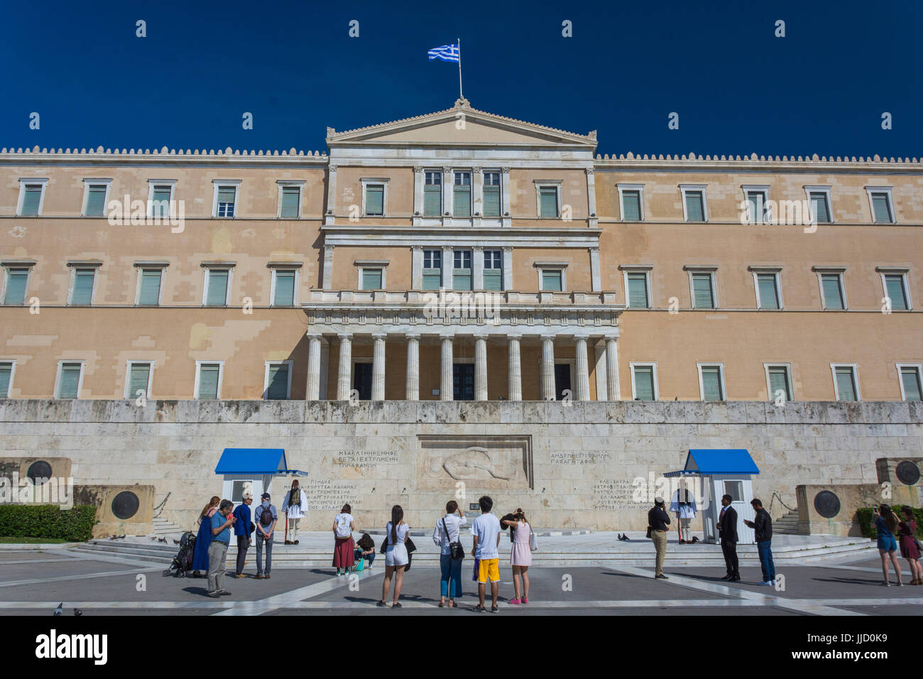 The Hellenic Parliament is the parliament of Greece, located in the Old Royal Palace, overlooking Syntagma Square in Athens. Stock Photo