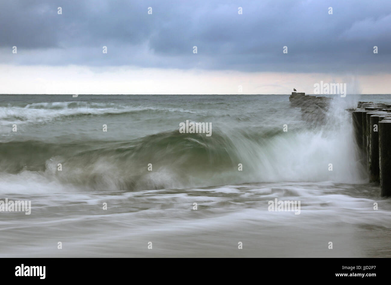 Kuehlungsborn, Germany, waves of the Baltic Sea break at a grotto Stock Photo