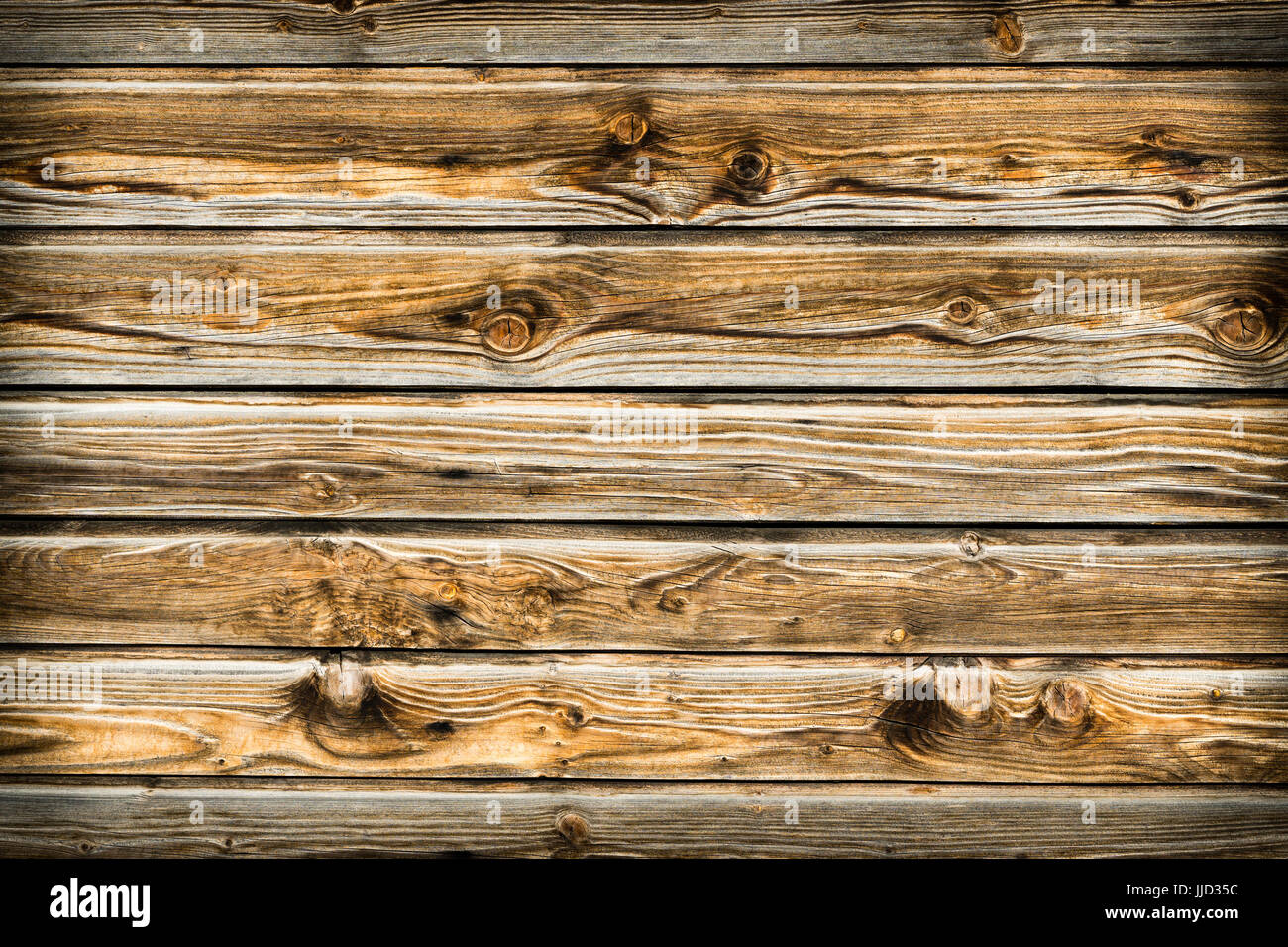 Natural brown barn wood wall. Wooden textured background pattern. Stock Photo