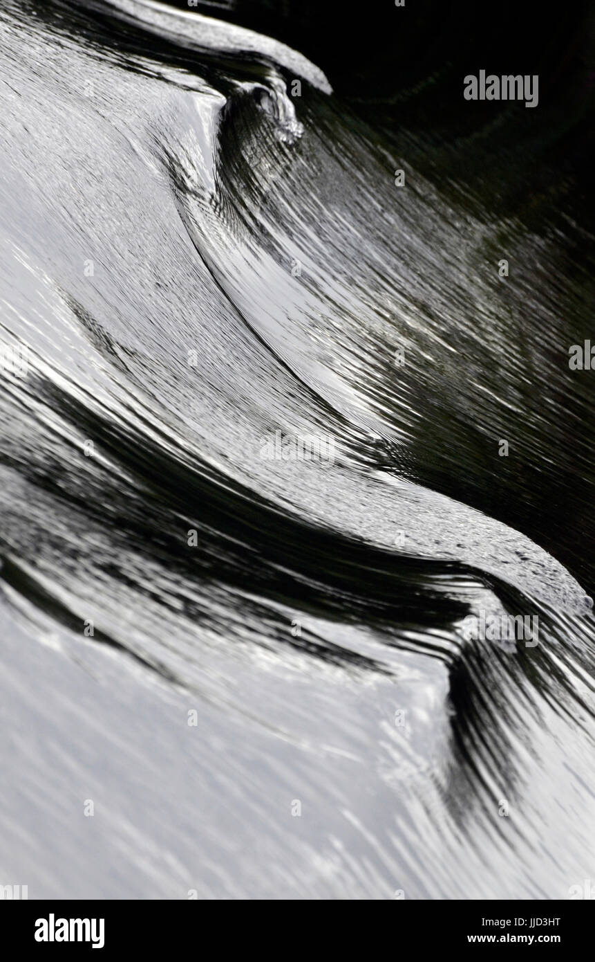 ripples in water behind boat engine Stock Photo - Alamy