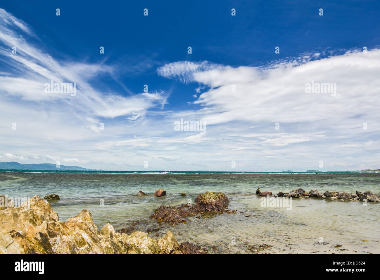 Seascape of coastline with blue sky and white clouds in sunny day Stock ...