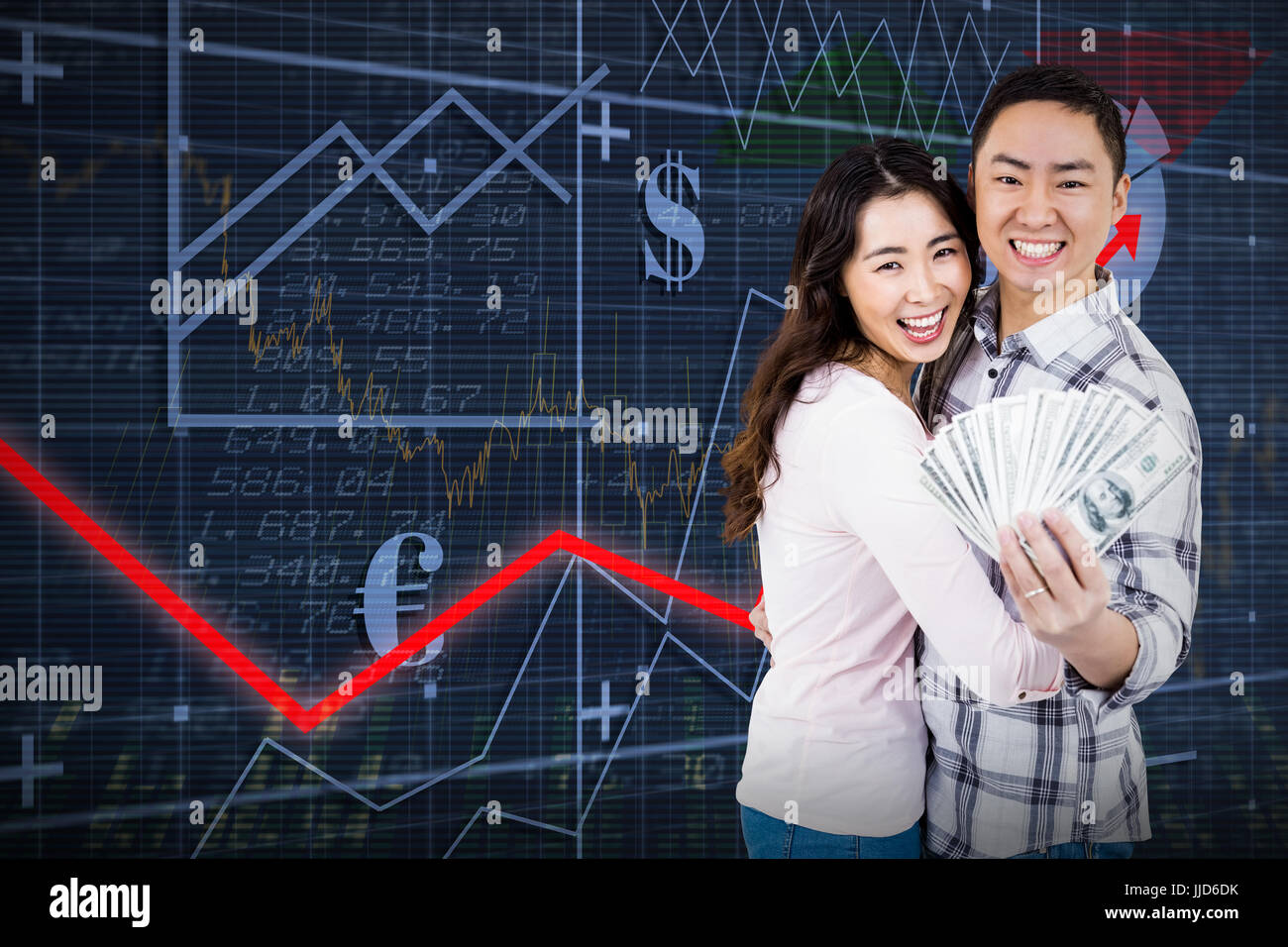Portrait of smiling couple holding money against red arrow Stock Photo ...