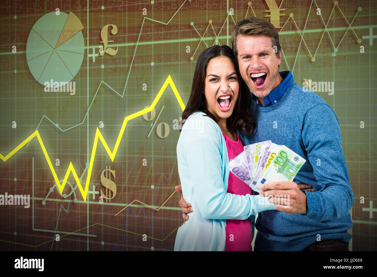 Excited couple holding money against red arrow Stock Photo - Alamy