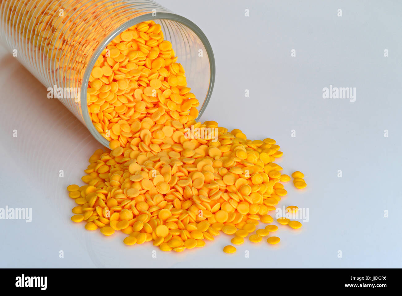 Industrial plastic pellets, industrial  beads on white color background. Stock Photo