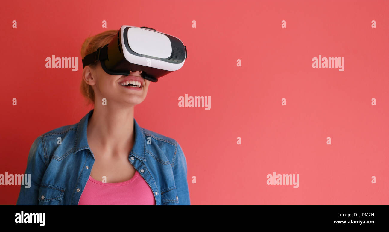 Happy girl getting experience using VR headset glasses of virtual ...