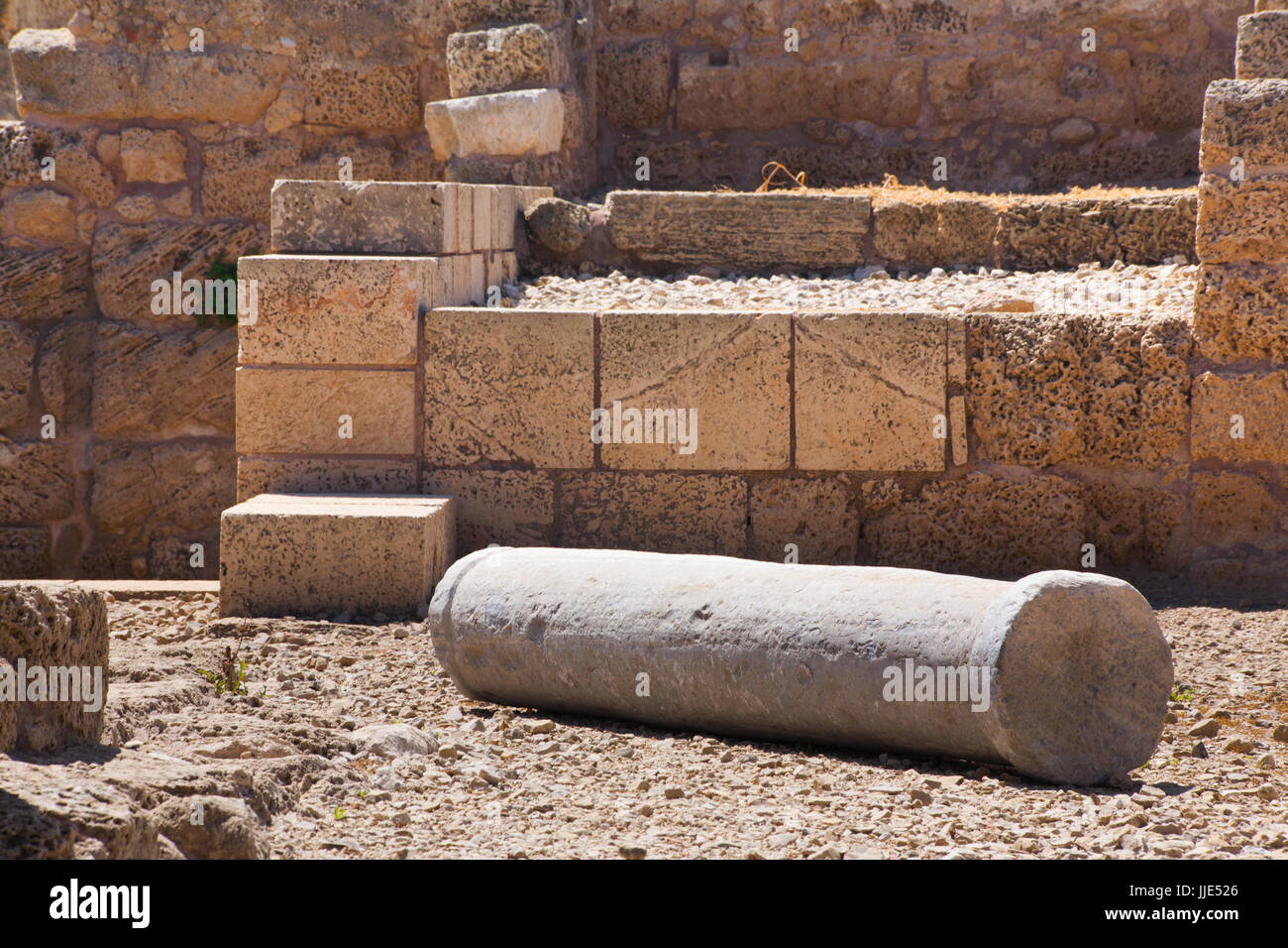 Roman falled stone pillar in cesarea Archaeological site close to Herod the Great hippodrome Stock Photo