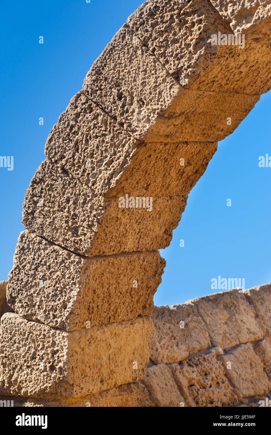 Roman old stone arc in caesarea Archaeological site close to Herod the Great hippodrome Stock Photo