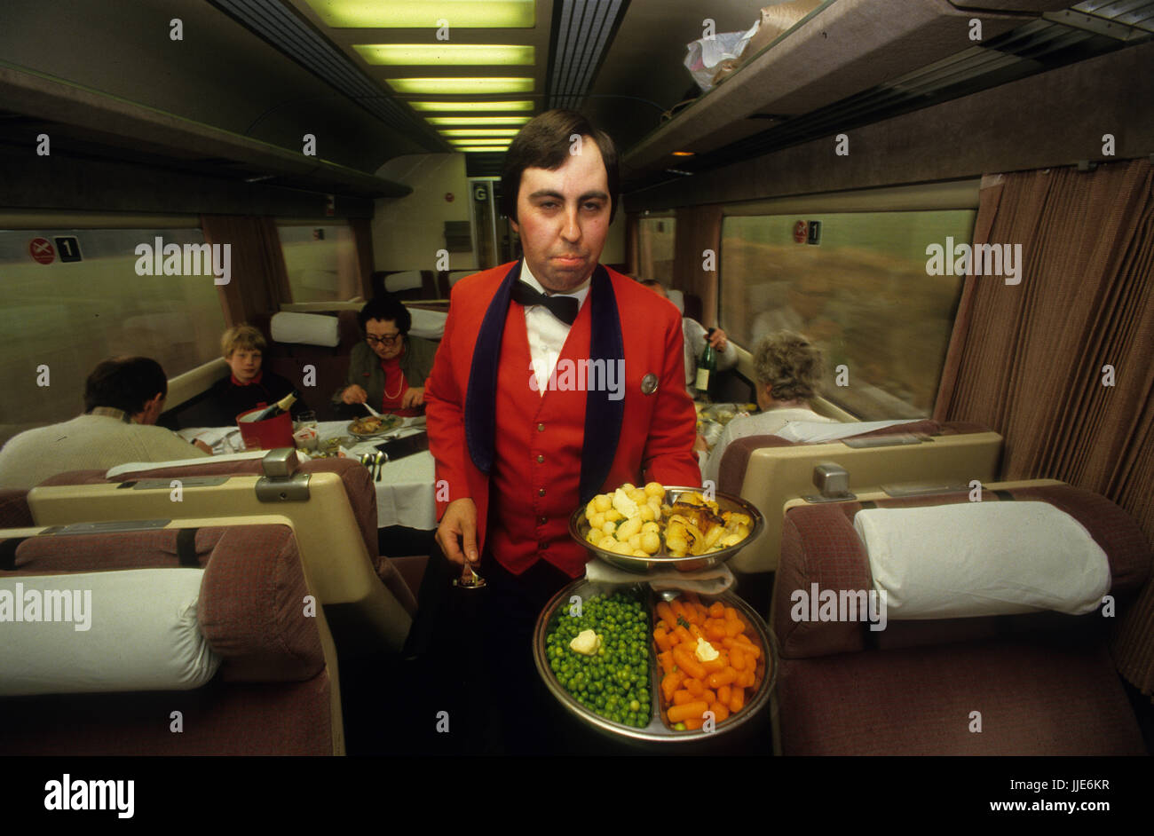 Train journey from London Paddington to Penzance in 1985. British Rail Intercity 125 train journey photographed for the Sunday Express Magazine with permission in 1985. Showing first and second class travel and silver service serving of lunch cooked onboard. Stock Photo